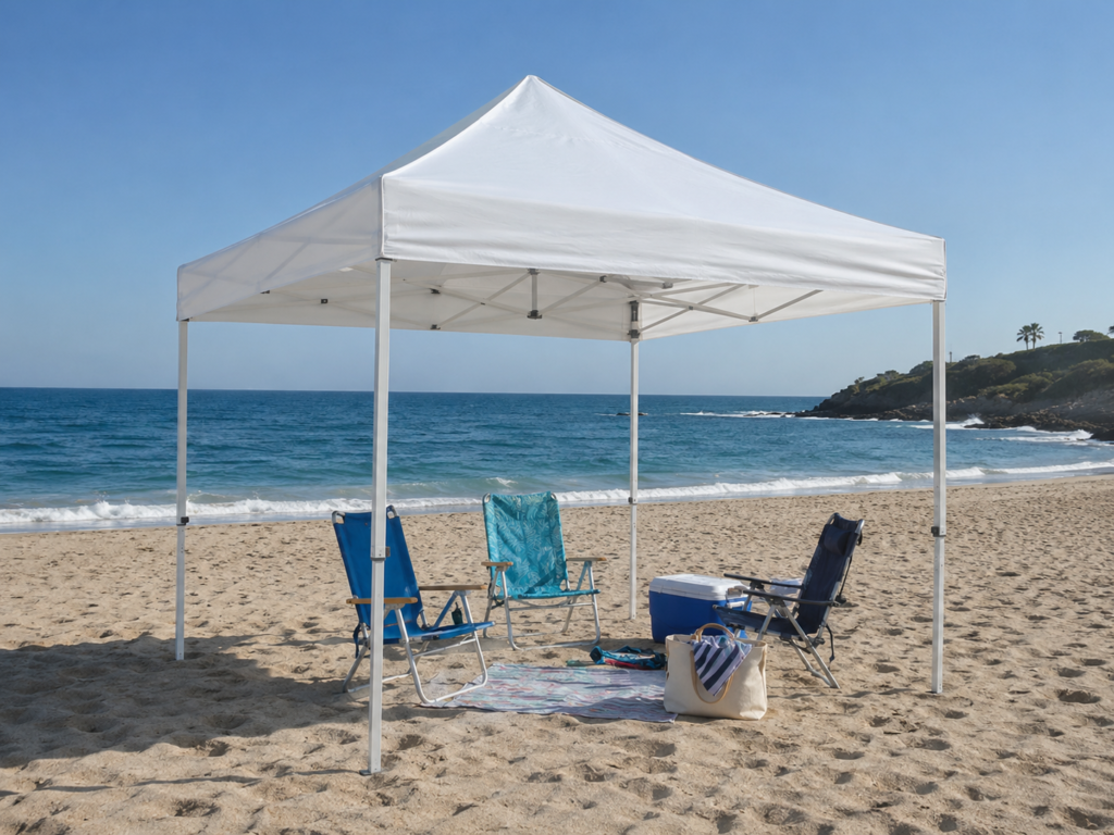 Carpa plegable 3x3 abierta instalada en la playa para crear una zona de sombra